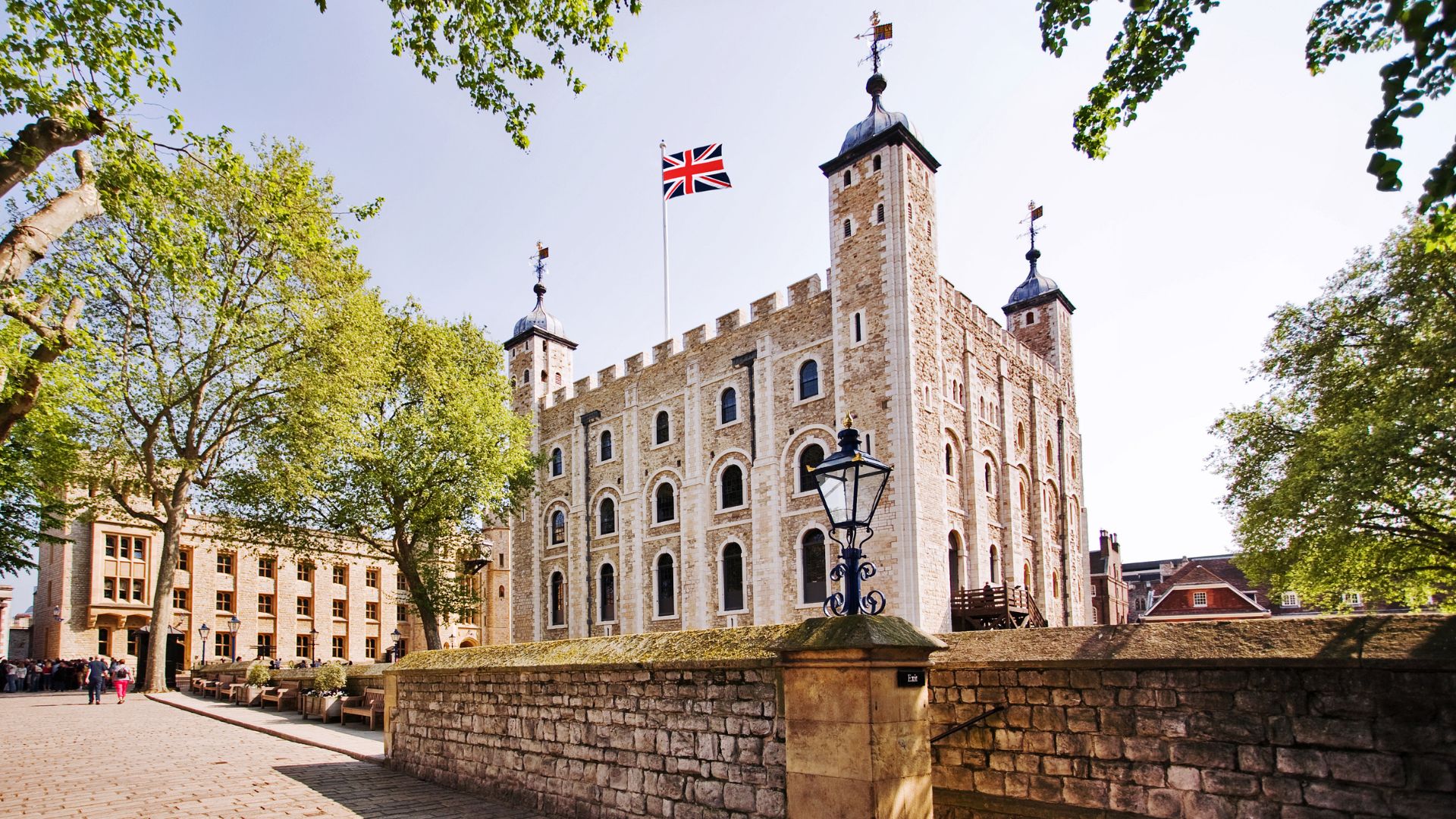The iconic Medieval Palace at the Tower of London. Image courtesy of Shutterstock/Justin Black. The white brick walls and tall towers of the historic medieval palace at the tower of London.