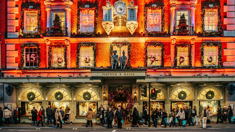 Festive decorations adorning Fortnum & Mason at Christmas. © Michael Barrow/London & Partners. Image courtesy of London & Partners. Dazzling lights decorate the exterior of Fortnum & Mason on Piccadilly