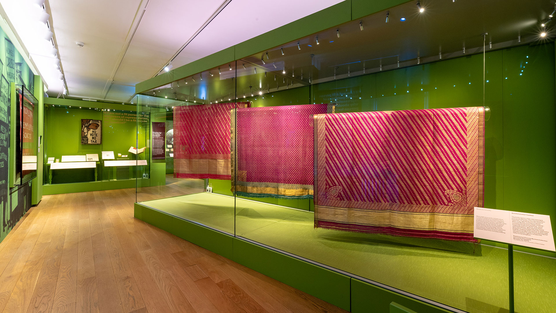 In celebration of Princess Sophia Duleep's 150th birthday, Kensington Palace's new exhibition, 'The Last Princesses of Punjab', pays tribute to the royal princess, suffragette, and the women who shaped her life. Image courtesy of Historic Royal Palaces/Richard Lea-Hair. Green room at Kensington Palace where pink dupattas, indian drapes attire are exhibited, belonging to the princesses and Duleep-Singh sisters.