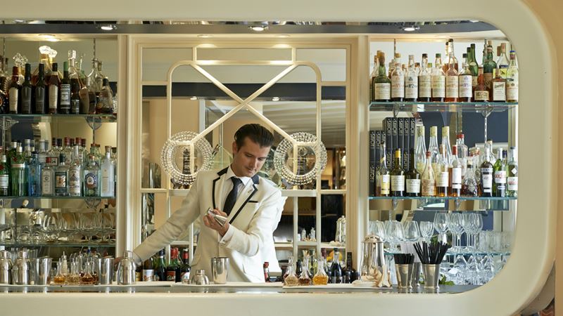Tipping is optional, although not usually expected, in cafes, pubs and bars. Credit: Fairmont Hotels Group. Image courtesy of Fairmont Hotels Group. Bartender at the American Bar at The Savoy Hotel