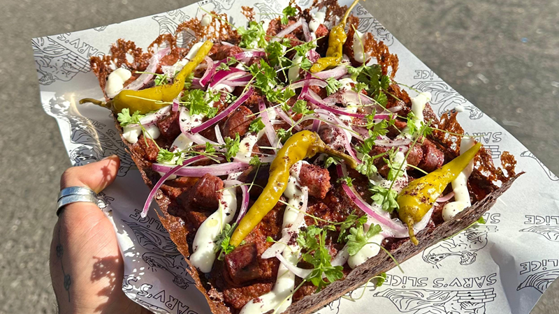 Grab a Detroit-style pizza with unique topping combinations at Sarv's Slice in Ealing. Credit: Sarv's Slice. Image courtesy of Sarv's Slice. A Detroit-style pizza pie with peppers, onions and salami