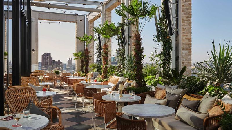 Savour delicious cocktails and seafood at Seabird. Credit: The Hoxton & Seabird. Image courtesy of The Hoxton & Seabird. The Seabird rooftop terrace.