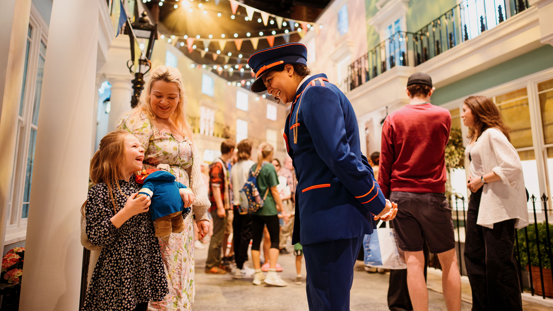 Take the kids to meet their favourite characters and experience the world of Paddington Bear Experience. Image courtesy of Golden Tours. A station master greets visitors at the Paddington Bear Experience.