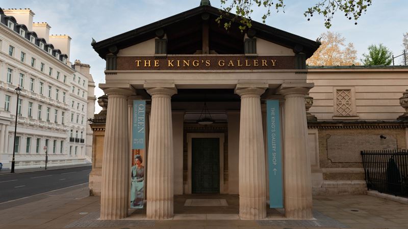 See treasures from the Royal Collection at The King's Gallery. Image courtesy of the Royal Collection Trust. Exterior of The King's Gallery with posters of the Queen Elizabeth II: Her Life in Style exhibition outside.