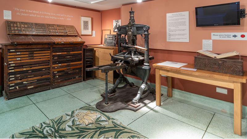 See William Morris's original printing press at The William Morris Society's Kelmscott House. Photo credit: Frame My Space. Image courtesy of The William Morris Society. The original printing press at The William Morris Society's Kelmscott House and a cabinet with drawers behind.
