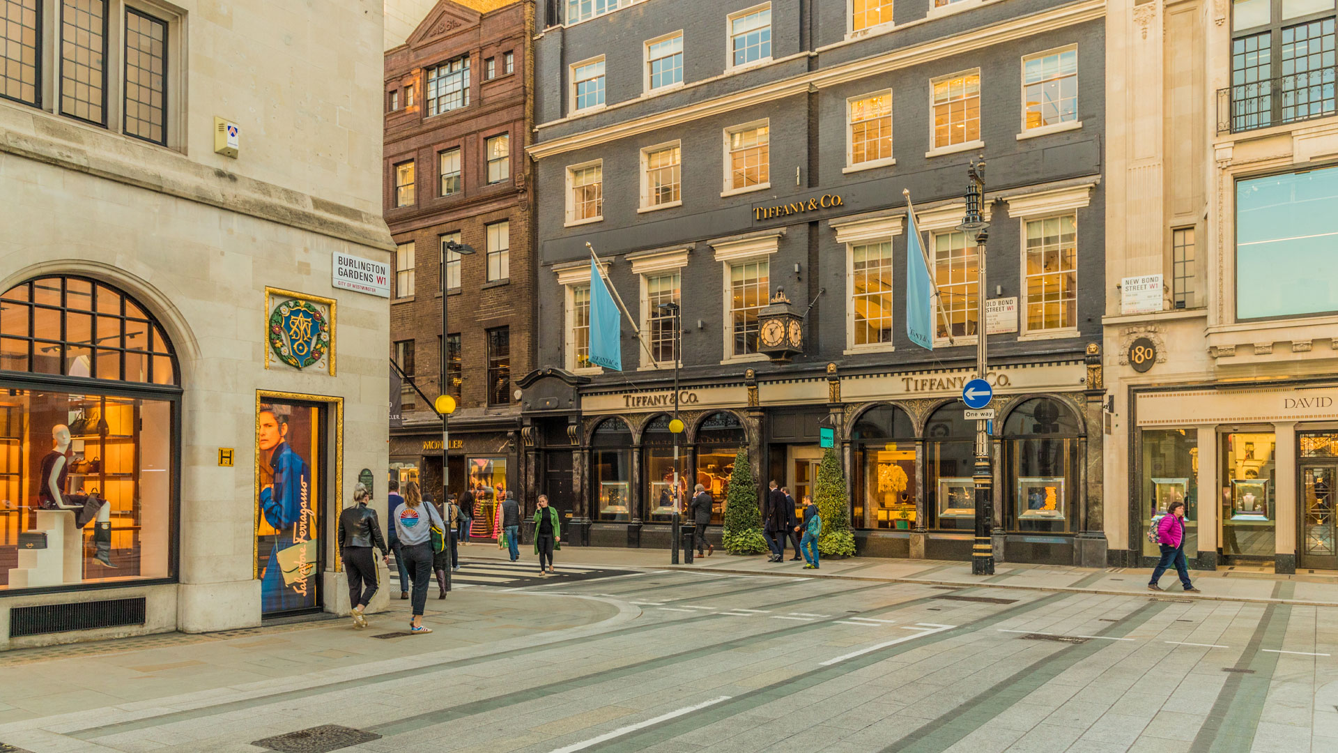 Discover elegant stores and luxury brands on fashionable Bond Street in Mayfair. Image courtesy of Shutterstock. A view from Burlington Gardens on to Bond Street showing the Tiffany & Co store.