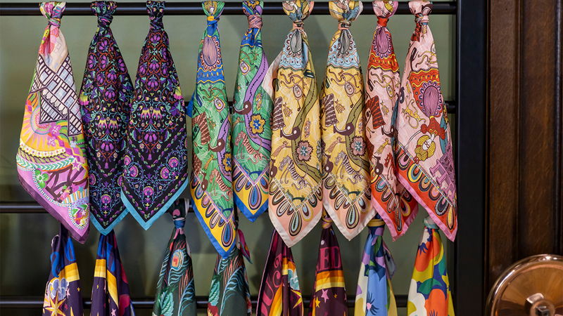 Discover an array of gorgeous fabrics at Liberty, London's heritage department store. Credit: Shutterstock. Image courtesy of Shutterstock. Colourful and patterned silk scarves hanging in Liberty