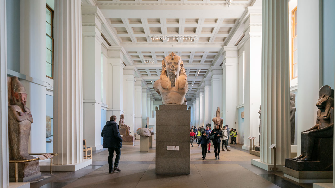 Immerse yourself within egyptian culture at the British Museum. Image courtesy of London & Partners/Jon Reid. Visitors walk within the egyptian collection at the British Museum.