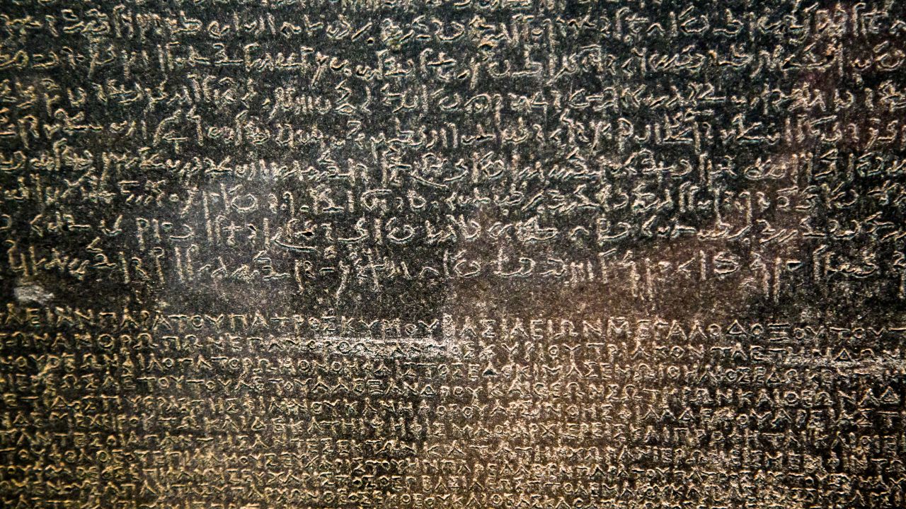 See the scripts of The Rosetta Stone used to decipher ancient Hieroglyphics at the British Museum. Image courtesy of Golden Tours Scripts of The Rosetta Stone used to decipher ancient Hieroglyphics at the British Museum.
