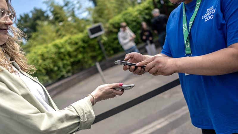 Buy The London Pass to make savings and access many top attractions, tours and experiences © Michael Barrow / London & Partners A woman has her London Pass scanned on her smartphone by an attenant wearing a London Zoo polo shirt.