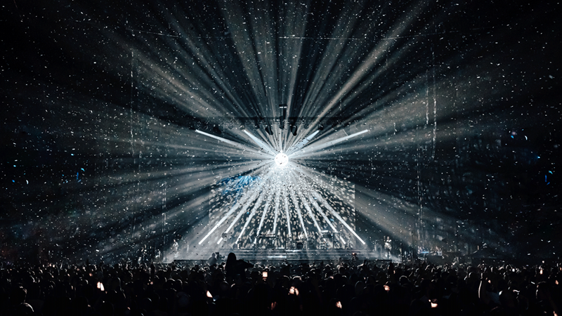Watch world-class performers at The O2, a famed 20,000 capacity venue. Credit: Luke Dyson. Image courtesy of The O2. Lights shine off a disco ball at The O2 as Sugababes play