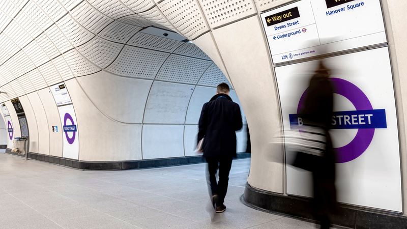 Find Elizabeth line stations dotted across key central and outer London areas. Credit: Shutterstock. Image courtesy of Shutterstock. A photo of two commuters walking through the modern Elizabeth line station at Bond Street