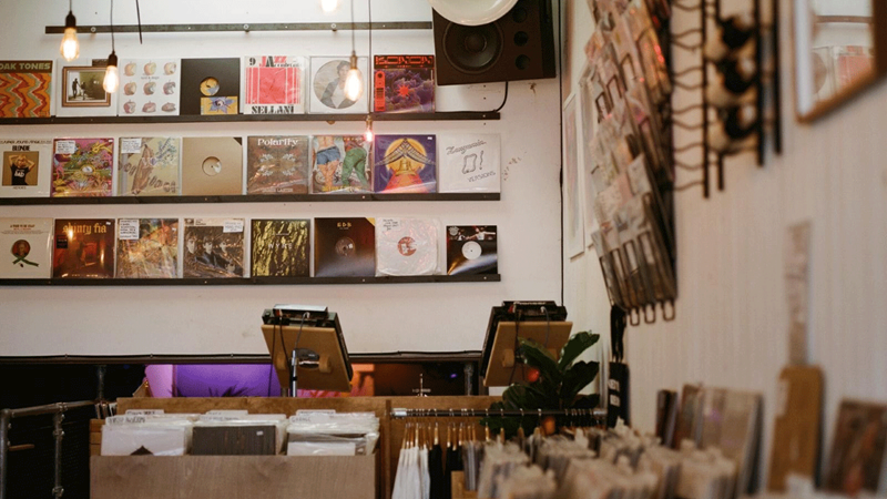 Hunt for vinyls old and new at Next Door Records in Shepherd's Bush. Credit: Seb Gardner. Image courtesy of Next Door Records. Records are dotted around the whole venue with DJ decks and speakers