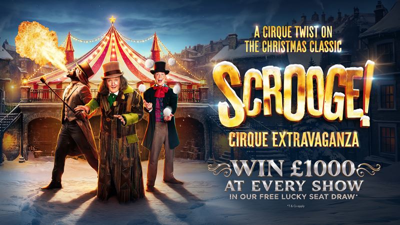 Enjoy a cirque-style twist on the classic Scrooge tale at the Excel London. Image courtesy of London Theatre Direct. Poster artwork of characters from Scrooge standing smiling in front of a circus top, with gold lettering for the show.